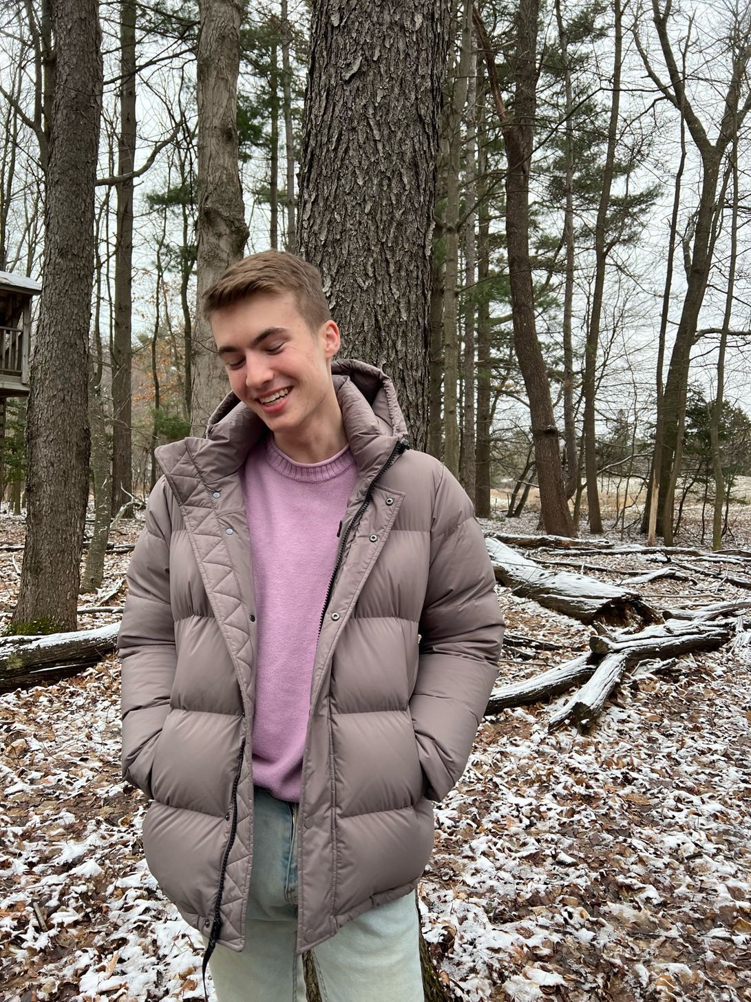 Me in a winter coat in front of a tree